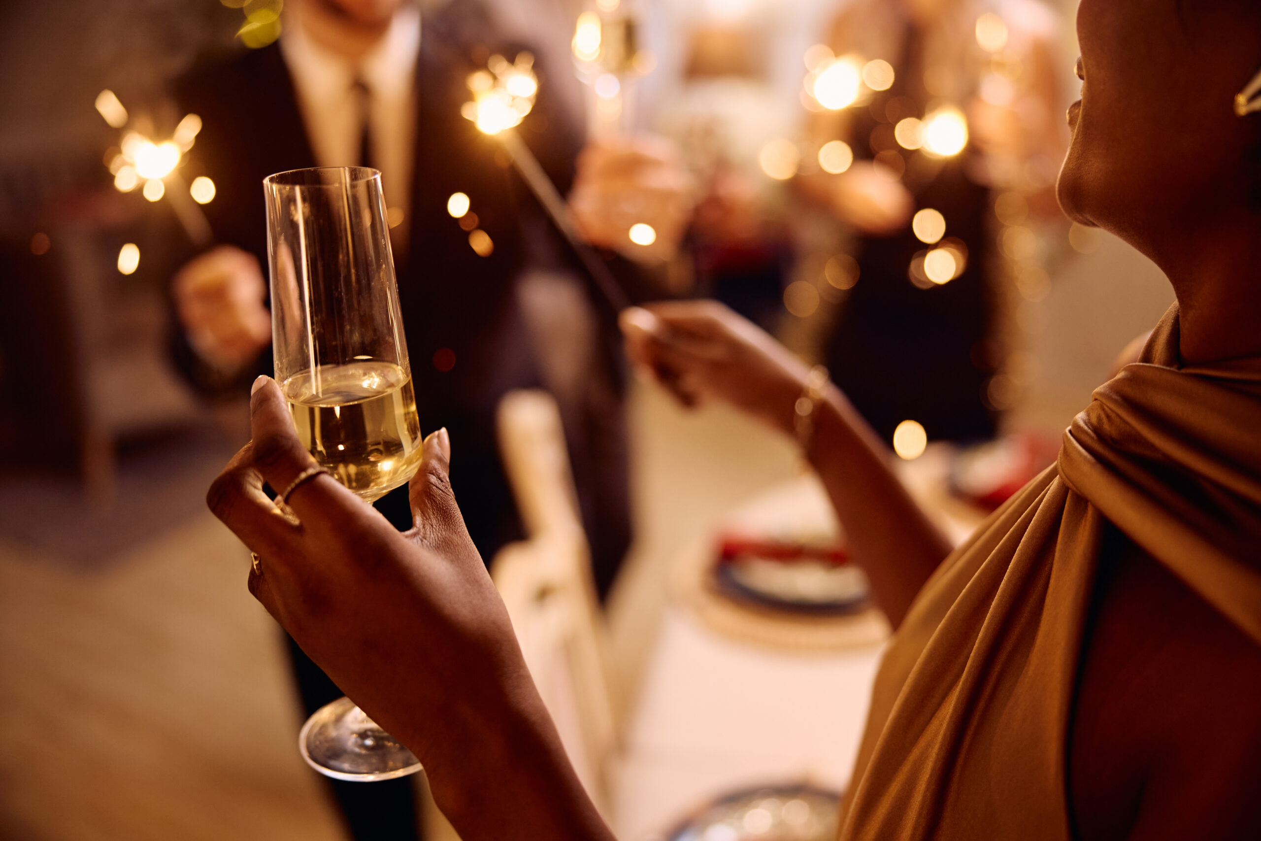 Close up of black woman having fun on Christmas party.
